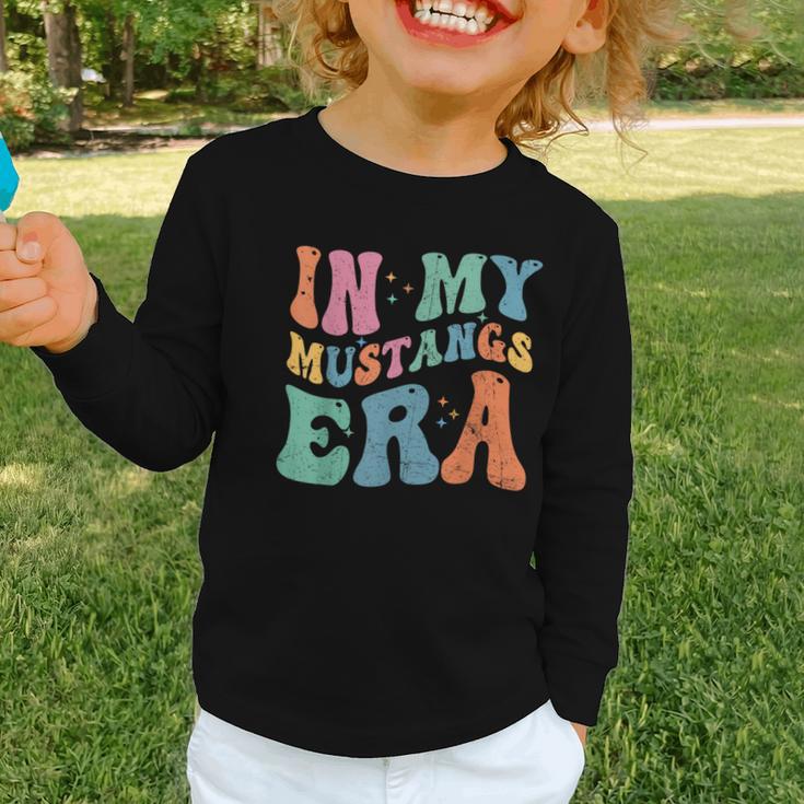 In My Mustangs Era Back To School Spirit Game Retro Groovy Graphic Toddler Long Sleeve Tee In My Mustangs Era Back To School Spirit Game Retro Groovy Graphic Toddler Long Sleeve Tee