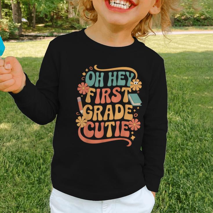 Oh Hey First Grade Cutie Back To School Graphic Toddler Long Sleeve Tee Oh Hey First Grade Cutie Back To School Graphic Toddler Long Sleeve Tee