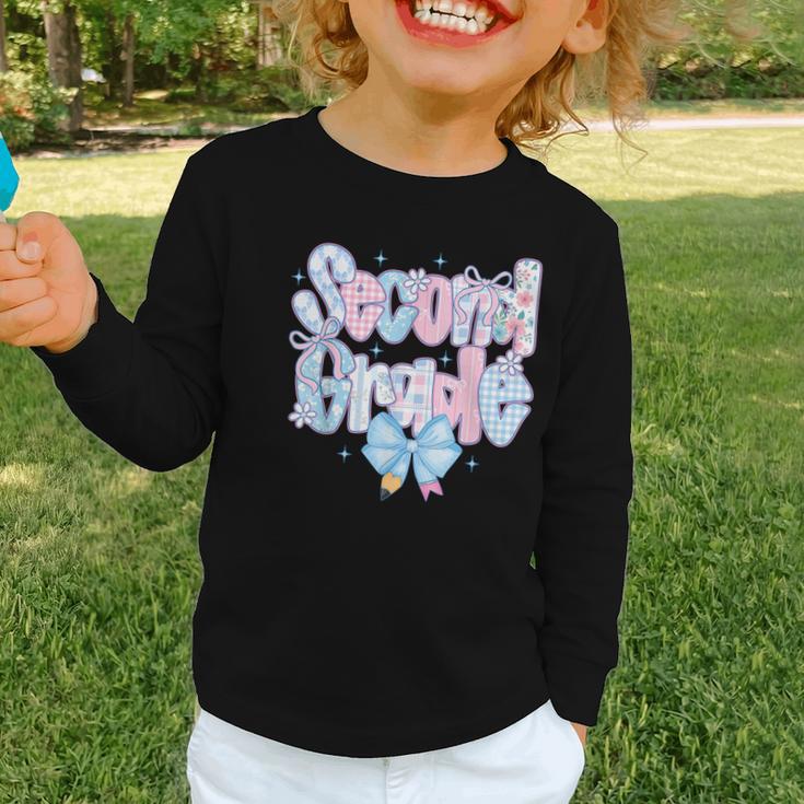 Preppy Second Grade First Day Back To School 2nd Grade Bow Graphic Toddler Long Sleeve Tee