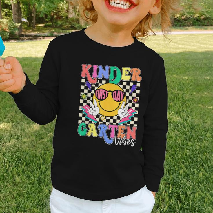 Retro Groovy Kinder Garten Vibes Smile Team Back To School Graphic Toddler Long Sleeve Tee Retro Groovy Kinder Garten Vibes Smile Team Back To School Graphic Toddler Long Sleeve Tee