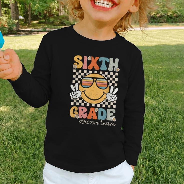 Sixth Grade Dream Team Smile Retro Back To School 6th Grade Graphic Toddler Long Sleeve Tee Sixth Grade Dream Team Smile Retro Back To School 6th Grade Graphic Toddler Long Sleeve Tee