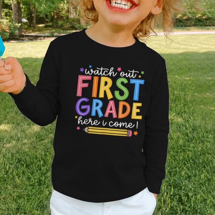 Watch Out First Grade Here I Come 1St Grade Back To School Graphic Toddler Long Sleeve Tee