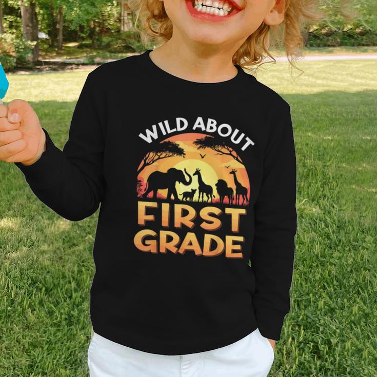 Wild About First Grade Zoo Animals Back To School Safari Graphic Toddler Long Sleeve Tee Wild About First Grade Zoo Animals Back To School Safari Graphic Toddler Long Sleeve Tee