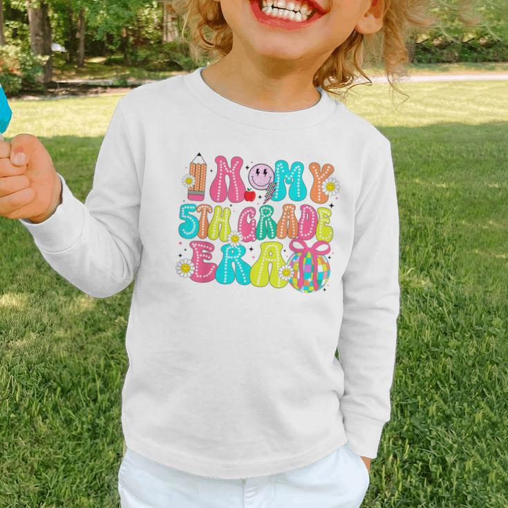 In My 5th Grade Era Coquette Bow Back To School Fifth Grade Graphic Toddler Long Sleeve Tee In My 5th Grade Era Coquette Bow Back To School Fifth Grade Graphic Toddler Long Sleeve Tee
