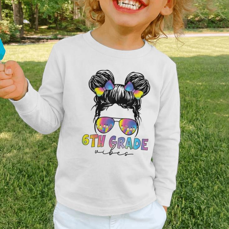 6th Grade Vibes Messy Hair Bun Girl Back To School First Day Graphic Toddler Long Sleeve Tee
