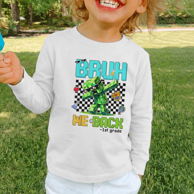Bruh We Back 1st Grade Back To School Gamer Dabbing Boy Kids Graphic Toddler Long Sleeve Tee Bruh We Back 1st Grade Back To School Gamer Dabbing Boy Kids Graphic Toddler Long Sleeve Tee