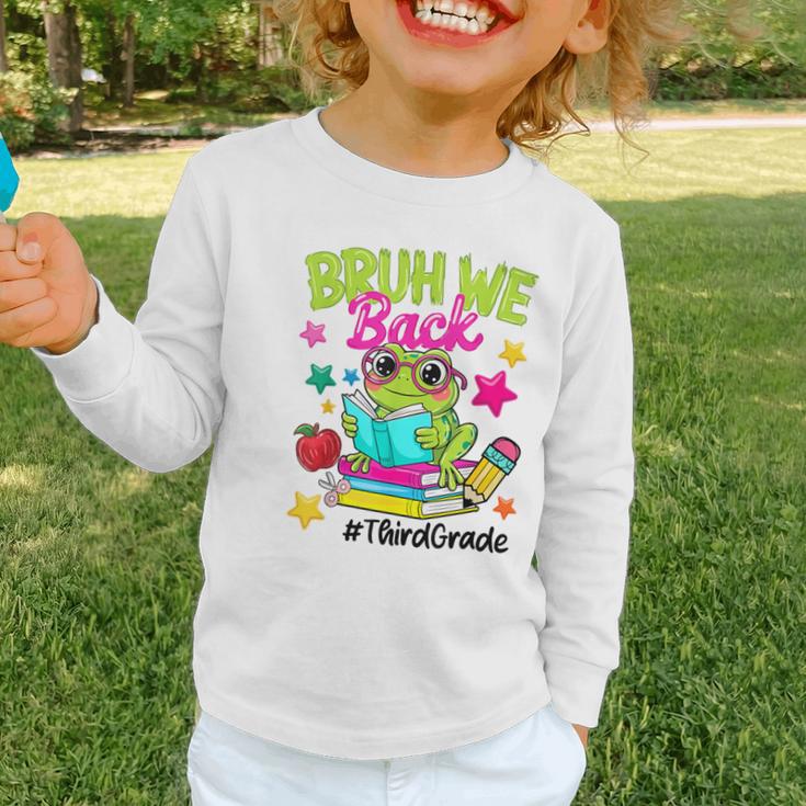 Bruh We Back Third Grade Cute Frog Back To School Graphic Toddler Long Sleeve Tee Bruh We Back Third Grade Cute Frog Back To School Graphic Toddler Long Sleeve Tee