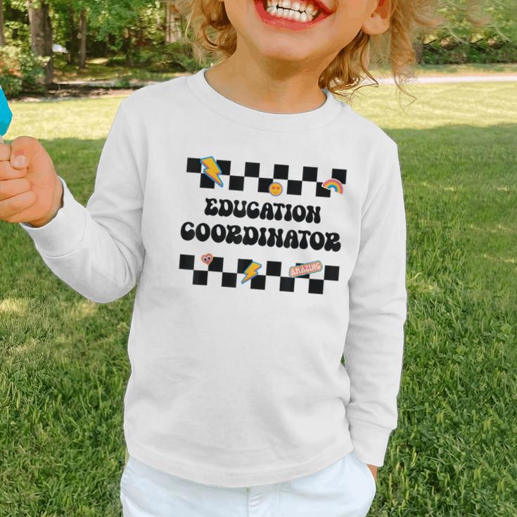 Education Coordinator Groovy Back To School Checkered Graphic Toddler Long Sleeve Tee Education Coordinator Groovy Back To School Checkered Graphic Toddler Long Sleeve Tee