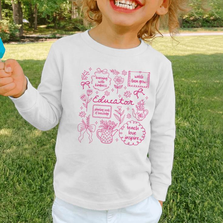 Educator Love Inspire Teach Pink Bow Back To School Graphic Toddler Long Sleeve Tee