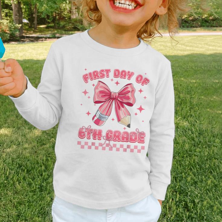 First Day Of 6th Grade Coquette Back To School Girls Kids Graphic Toddler Long Sleeve Tee