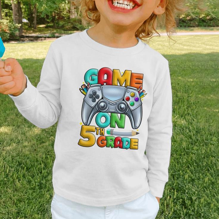 Game On 5th Grade Back To School 5th Grade Level Unlocked Performance Graphic Toddler Long Sleeve Tee Game On 5th Grade Back To School 5th Grade Level Unlocked Performance Graphic Toddler Long Sleeve Tee