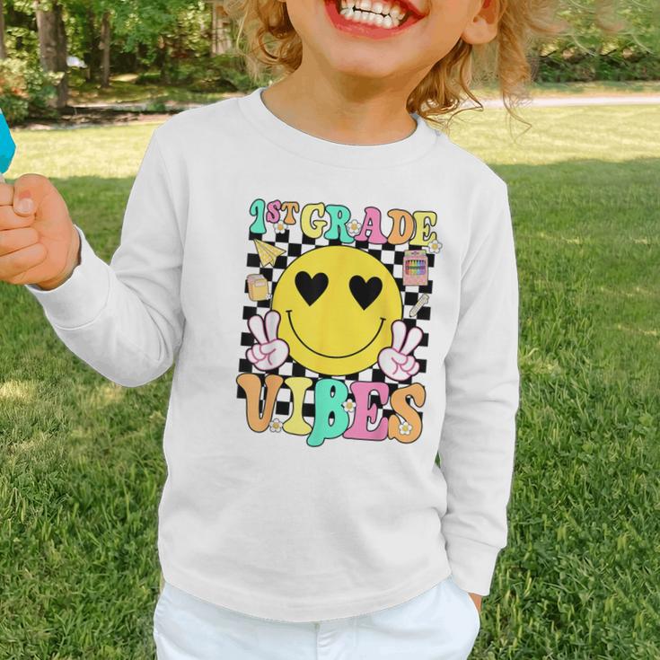 Girls 1st Grade Vibes Smile Face Back To School First Grade Graphic Toddler Long Sleeve Tee
