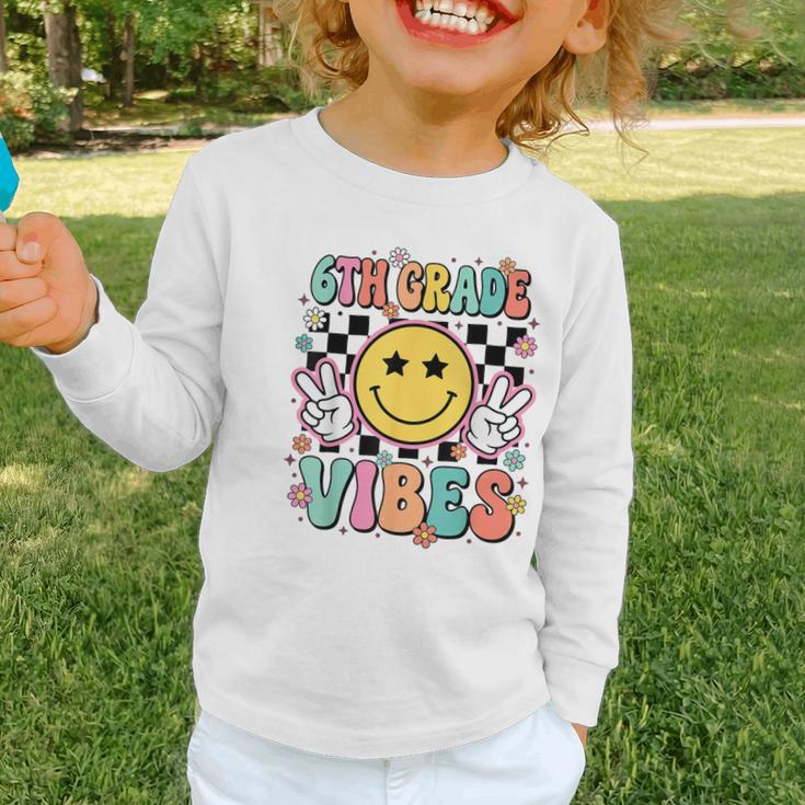 Groovy Sixth 6TH Grade Vibes Back To School First Day Kids Graphic Toddler Long Sleeve Tee