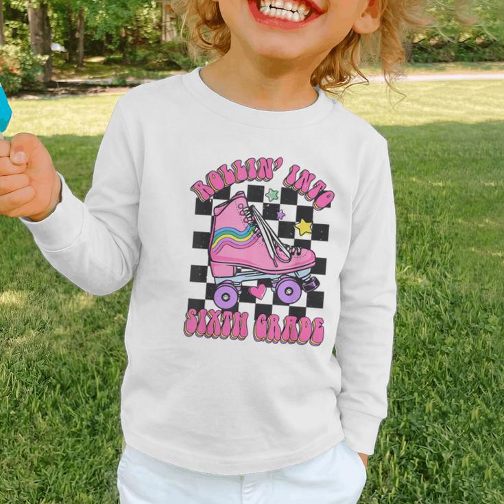 Kids Back To School Skating Rollin Into Sixth 6th Grade Graphic Toddler Long Sleeve Tee Kids Back To School Skating Rollin Into Sixth 6th Grade Graphic Toddler Long Sleeve Tee