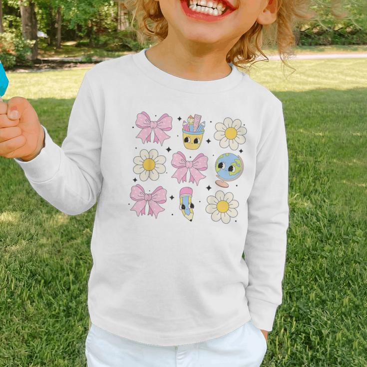 Retro Groovy Back To School Coquette First Day Of School Graphic Toddler Long Sleeve Tee