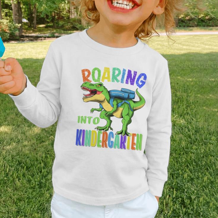 Roaring Into Kindergarten DinosaurRex Back To School Boys Performance Graphic Toddler Long Sleeve Tee Roaring Into Kindergarten DinosaurRex Back To School Boys Performance Graphic Toddler Long Sleeve Tee