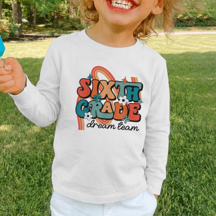 Sixth Grade Dream Team 1st Day Of 6th Grade Back To School Graphic Toddler Long Sleeve Tee Sixth Grade Dream Team 1st Day Of 6th Grade Back To School Graphic Toddler Long Sleeve Tee