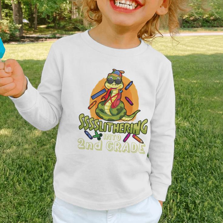 Slithering Into 2nd Grade First Day Back To School Snake Performance Graphic Toddler Long Sleeve Tee Slithering Into 2nd Grade First Day Back To School Snake Performance Graphic Toddler Long Sleeve Tee