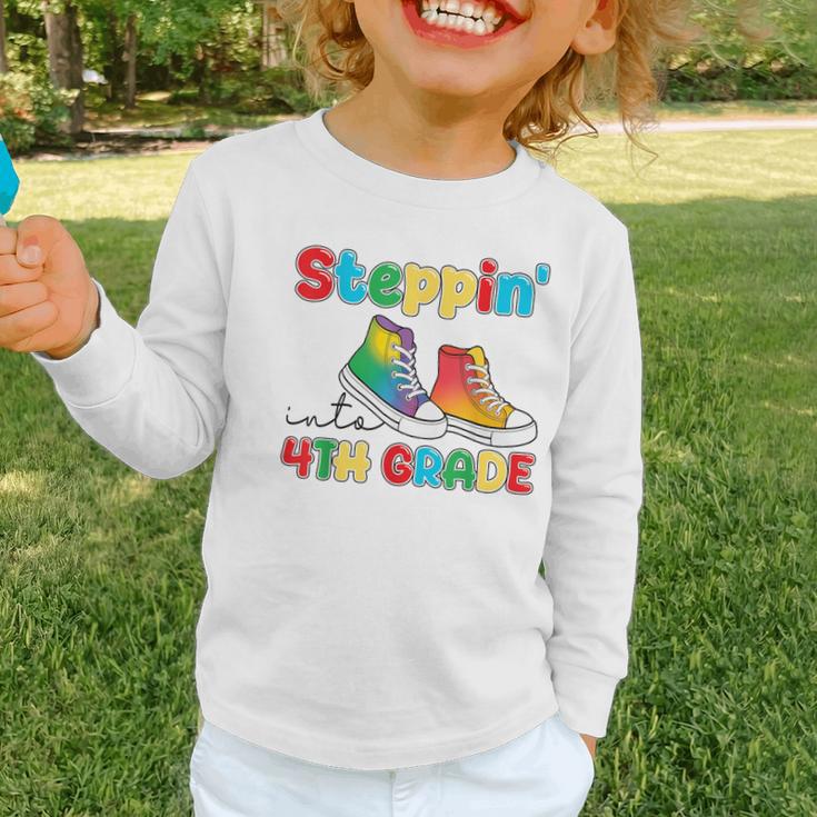 Steppin Into Fourth Grade Back To School First Day 4th Grade Graphic Toddler Long Sleeve Tee