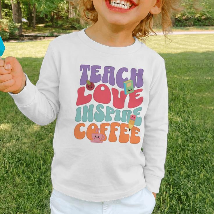 Teach Love Inspire Coffee Cute Teaching Quote Back To School Graphic Toddler Long Sleeve Tee Teach Love Inspire Coffee Cute Teaching Quote Back To School Graphic Toddler Long Sleeve Tee