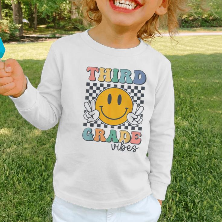 Third Grade Vibes Retro Smile Back To School 3rd Grade Team Graphic Toddler Long Sleeve Tee Third Grade Vibes Retro Smile Back To School 3rd Grade Team Graphic Toddler Long Sleeve Tee