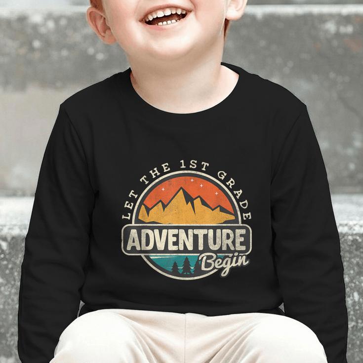 1st First Grade Shirt Adventure Begin Back To School Graphic Toddler Long Sleeve Tee 1st First Grade Shirt Adventure Begin Back To School Graphic Toddler Long Sleeve Tee