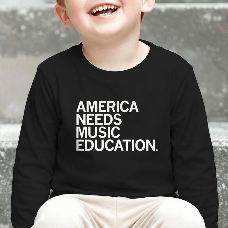 America Needs Music Education Advocacy Back To School Graphic Toddler Long Sleeve Tee America Needs Music Education Advocacy Back To School Graphic Toddler Long Sleeve Tee