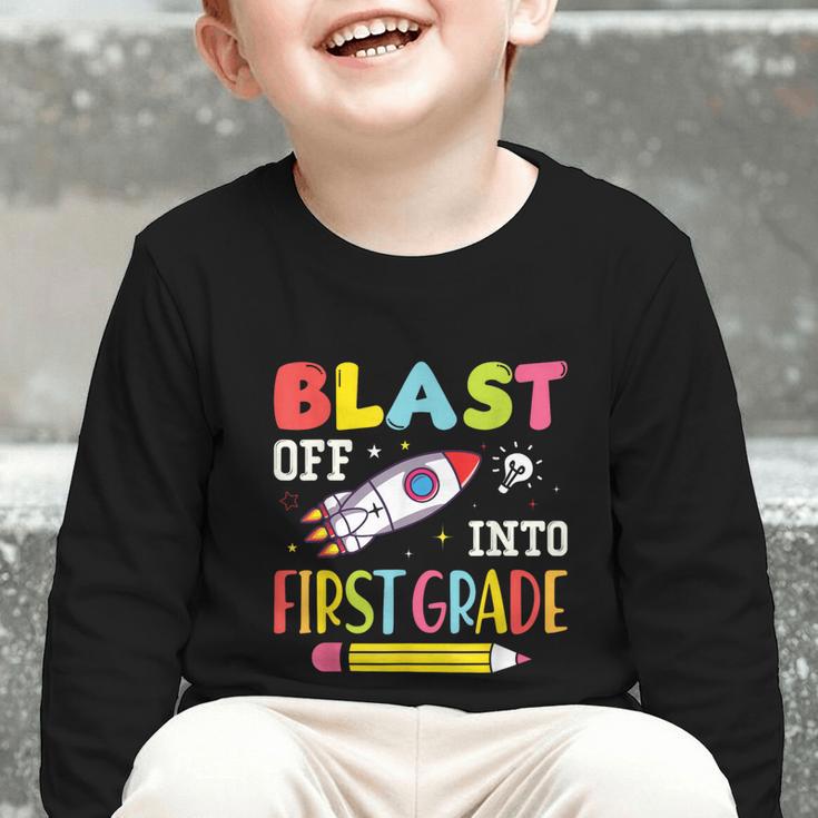 Blast Off Into First Grade Back To School Kids Rocket Space Graphic Toddler Long Sleeve Tee