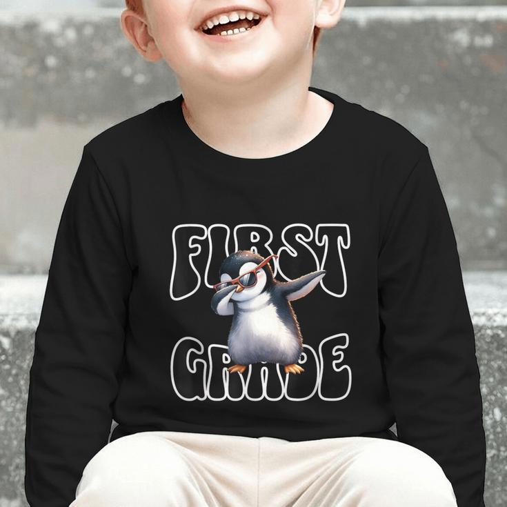 Cute Dabbing Penguin First Grade Back To School Graphic Toddler Long Sleeve Tee