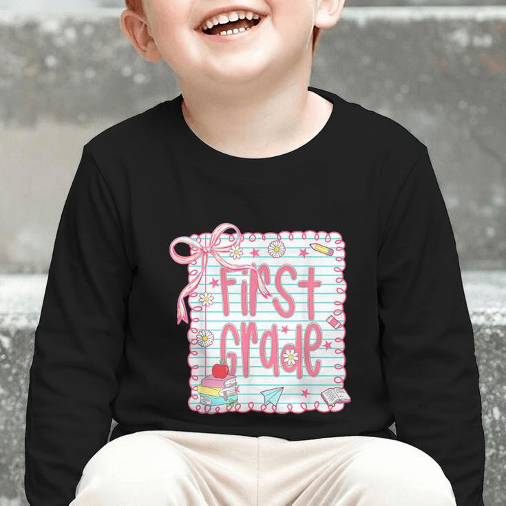 First Grade Coquette Bow Pink Preppy Back To School Girls Graphic Toddler Long Sleeve Tee