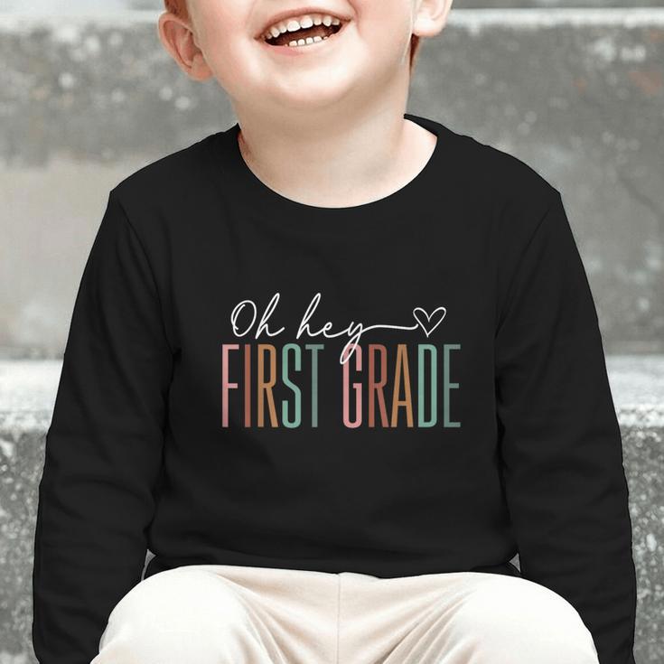 First Grade Oh Hey Retro Back To School 1st Grade Graphic Toddler Long Sleeve Tee First Grade Oh Hey Retro Back To School 1st Grade Graphic Toddler Long Sleeve Tee