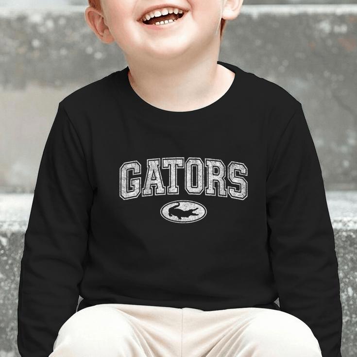 Gators High School Spirit Fan Team Gator Back To School Graphic Toddler Long Sleeve Tee Gators High School Spirit Fan Team Gator Back To School Graphic Toddler Long Sleeve Tee