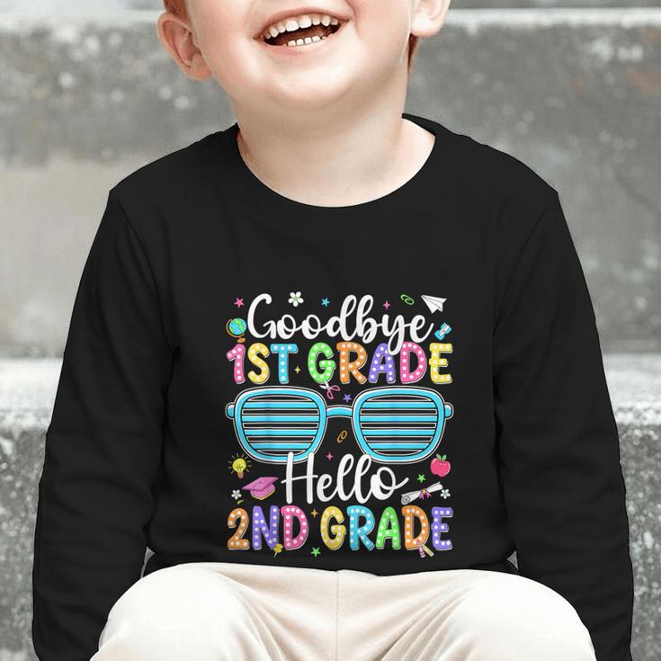 Goodbye 1st Grade Hello 2nd Grade Graduation Back To School Graphic Toddler Long Sleeve Tee Goodbye 1st Grade Hello 2nd Grade Graduation Back To School Graphic Toddler Long Sleeve Tee