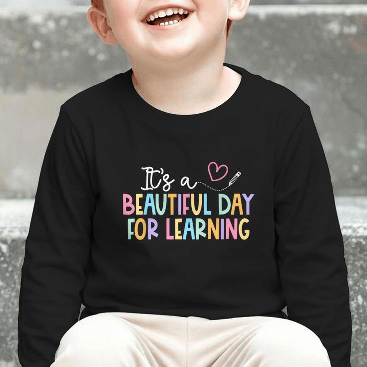 It's A Beautiful Day For Learning Back To School Graphic Toddler Long Sleeve Tee It's A Beautiful Day For Learning Back To School Graphic Toddler Long Sleeve Tee