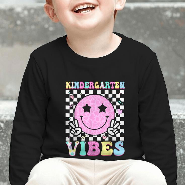 Kindergarten Vibes Groovy Back To School Kinder Girls Kids Graphic Toddler Long Sleeve Tee Kindergarten Vibes Groovy Back To School Kinder Girls Kids Graphic Toddler Long Sleeve Tee
