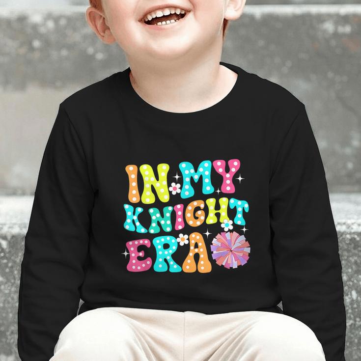 In My Knights Era Back To School Spirit Game Retro Groovy Graphic Toddler Long Sleeve Tee In My Knights Era Back To School Spirit Game Retro Groovy Graphic Toddler Long Sleeve Tee