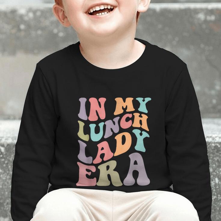 In My Lunch Lady Era Happy First Day Back To School Graphic Toddler Long Sleeve Tee In My Lunch Lady Era Happy First Day Back To School Graphic Toddler Long Sleeve Tee