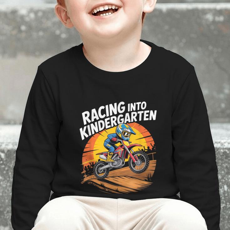 Motocross Back To School Dirt Bike Racing Into Kindergarten Graphic Toddler Long Sleeve Tee Motocross Back To School Dirt Bike Racing Into Kindergarten Graphic Toddler Long Sleeve Tee
