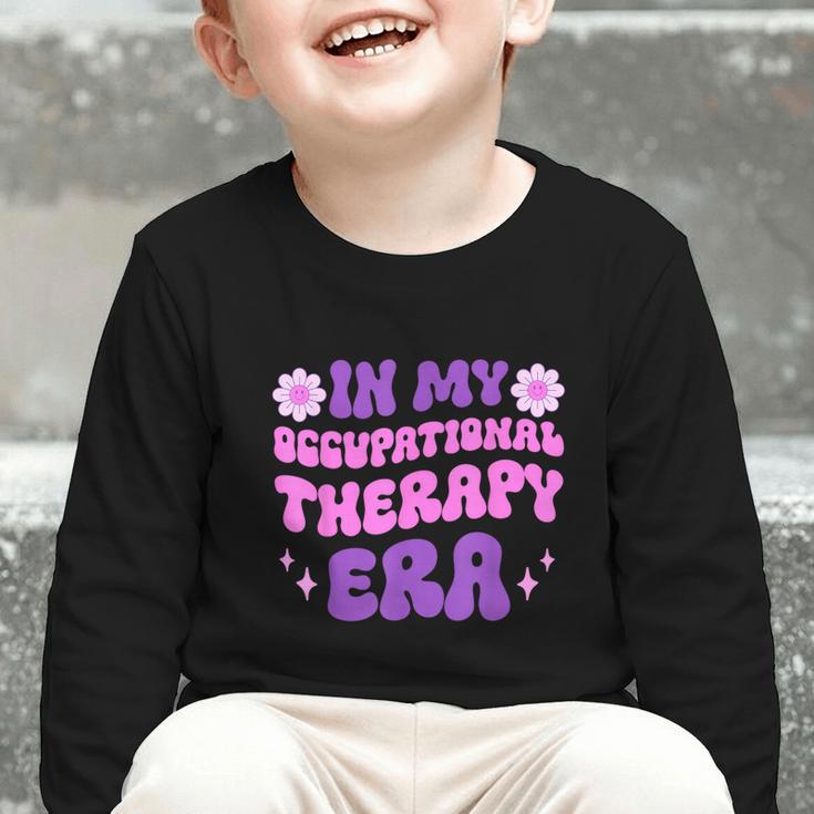 In My Occupational Therapy Era Groovy OT Back To School Graphic Toddler Long Sleeve Tee In My Occupational Therapy Era Groovy OT Back To School Graphic Toddler Long Sleeve Tee
