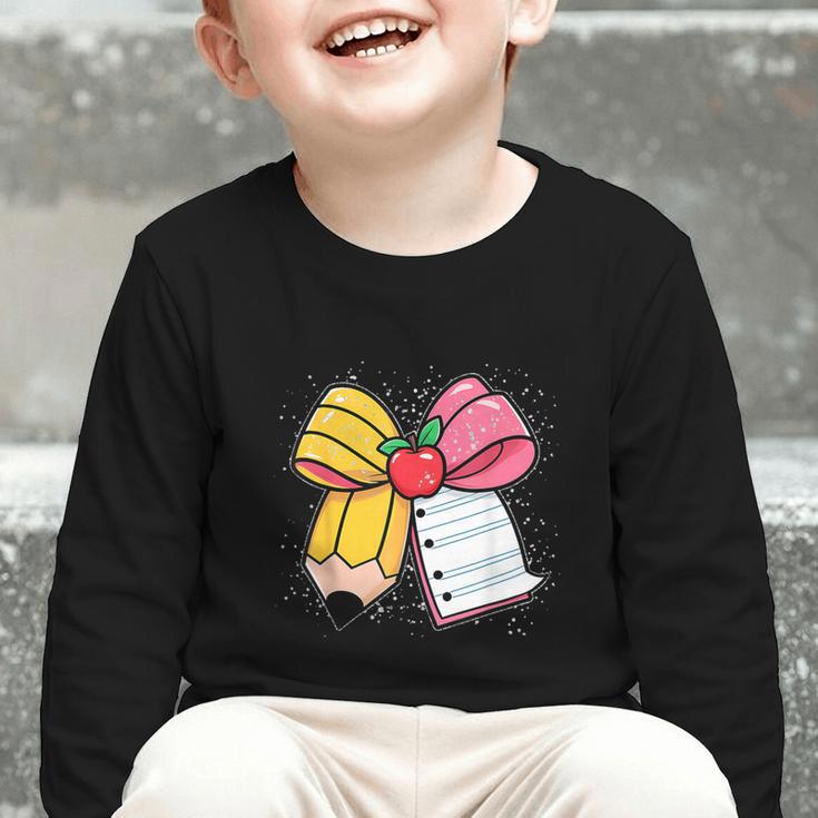 Pencil Coquette Bow Happy First Day Of School Back To School Graphic Toddler Long Sleeve Tee