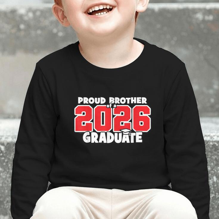 Proud Brother Of 2026 Graduate Matching Back To School R Graphic Toddler Long Sleeve Tee Proud Brother Of 2026 Graduate Matching Back To School R Graphic Toddler Long Sleeve Tee