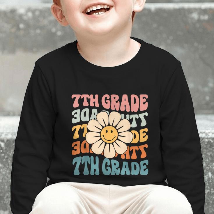 Retro 7th Grade Daisy Colorful Back To School Seventh Grade Graphic Toddler Long Sleeve Tee