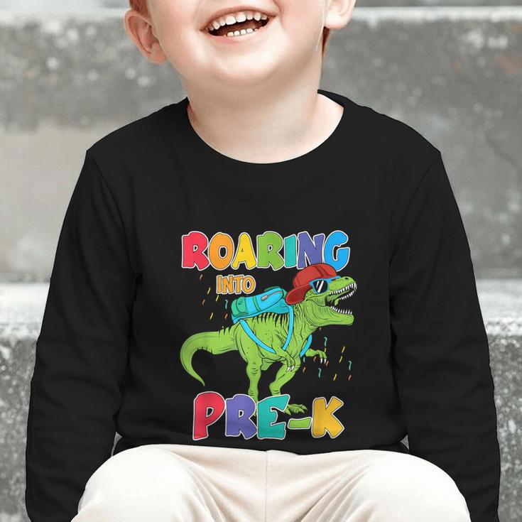 Roaring Into Pre-K Preschool Dinosaur Back To School Graphic Toddler Long Sleeve Tee Roaring Into Pre-K Preschool Dinosaur Back To School Graphic Toddler Long Sleeve Tee