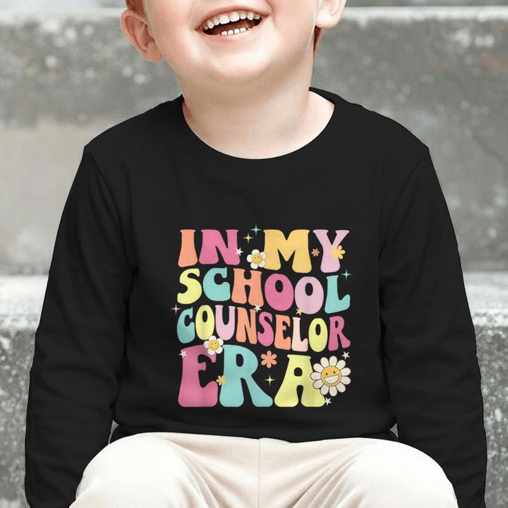 In My School Counselor Era Retro Back To School Counseling Graphic Toddler Long Sleeve Tee In My School Counselor Era Retro Back To School Counseling Graphic Toddler Long Sleeve Tee