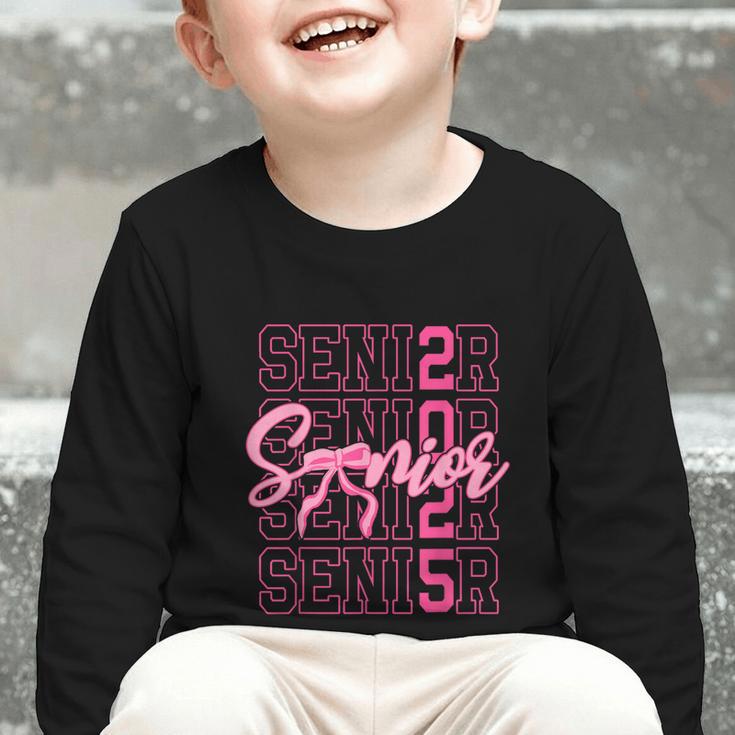Senior 2025 Coquette Pink Bow Class Of 2025 Back To School Graphic Toddler Long Sleeve Tee Senior 2025 Coquette Pink Bow Class Of 2025 Back To School Graphic Toddler Long Sleeve Tee