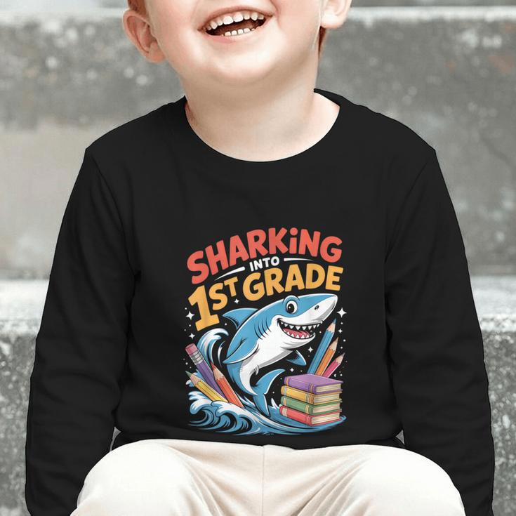 Sharking Into 1st Grade Back To School Shark Graphic Toddler Long Sleeve Tee Sharking Into 1st Grade Back To School Shark Graphic Toddler Long Sleeve Tee
