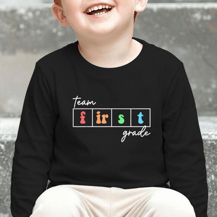 Team First Grade Back To School First Day Of 1st Grade Cute Graphic Toddler Long Sleeve Tee Team First Grade Back To School First Day Of 1st Grade Cute Graphic Toddler Long Sleeve Tee