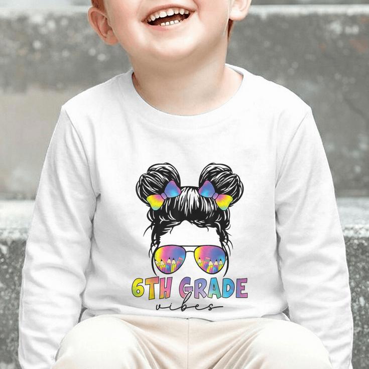 6th Grade Vibes Messy Hair Bun Girl Back To School First Day Graphic Toddler Long Sleeve Tee