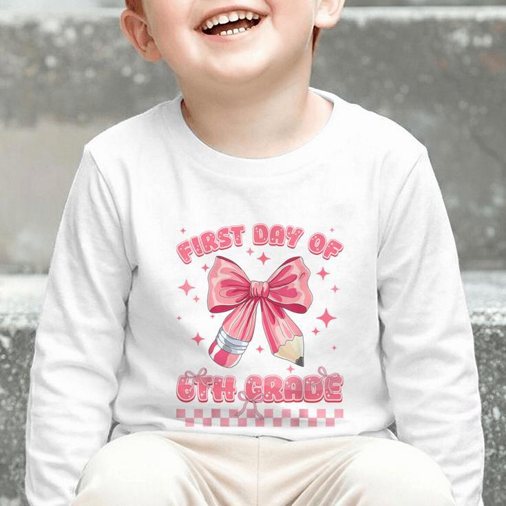 First Day Of 6th Grade Coquette Back To School Girls Kids Graphic Toddler Long Sleeve Tee
