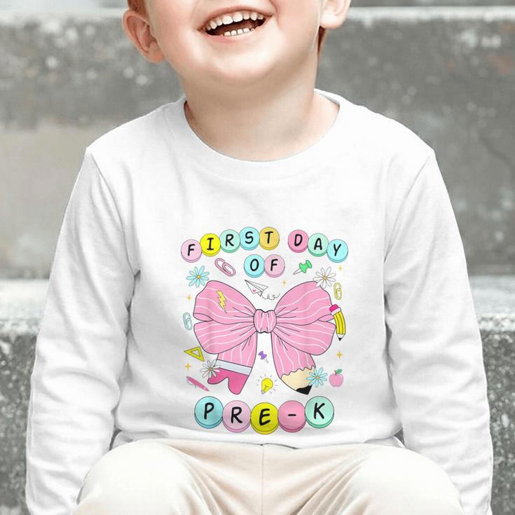 First Day Of Pre-K Girls Coquette Bow Back To School Kids Graphic Toddler Long Sleeve Tee First Day Of Pre-K Girls Coquette Bow Back To School Kids Graphic Toddler Long Sleeve Tee